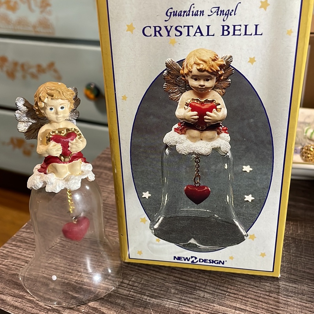 Vintage guardian Angel crystal bell. Comes in original box.